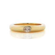 Domed ladies ring in 18ct yellow gold, gypsy set with a 0.20ct oval diamond.